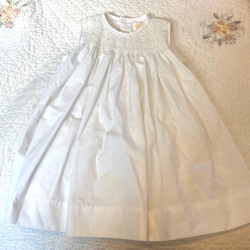 Petit Ami white smocked dress.